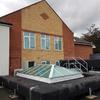 A pitched roof conversion to an existing external plant deck at a retirement village